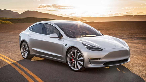 Electric-car maker Tesla unveiled the first of its Model 3